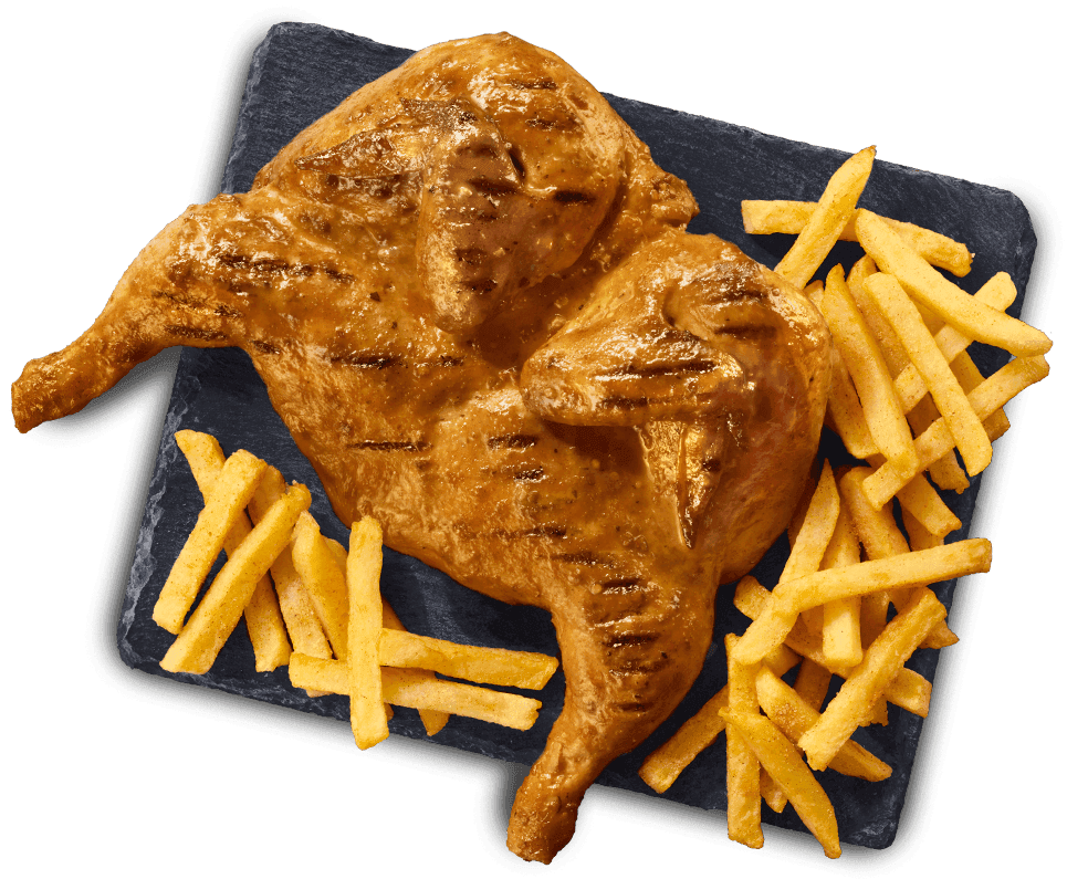 Flame grilled full chicken with crispy seasoned chips served on a black slate tray