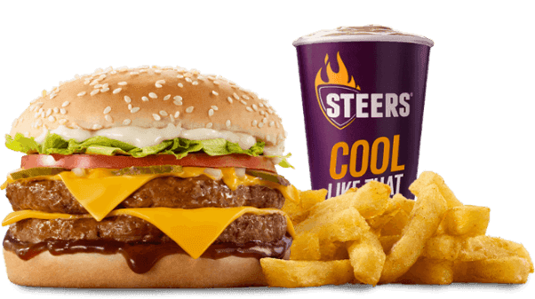 Double cheeseburger meal with seasoned chips and a creamy milkshake in a branded purple cup