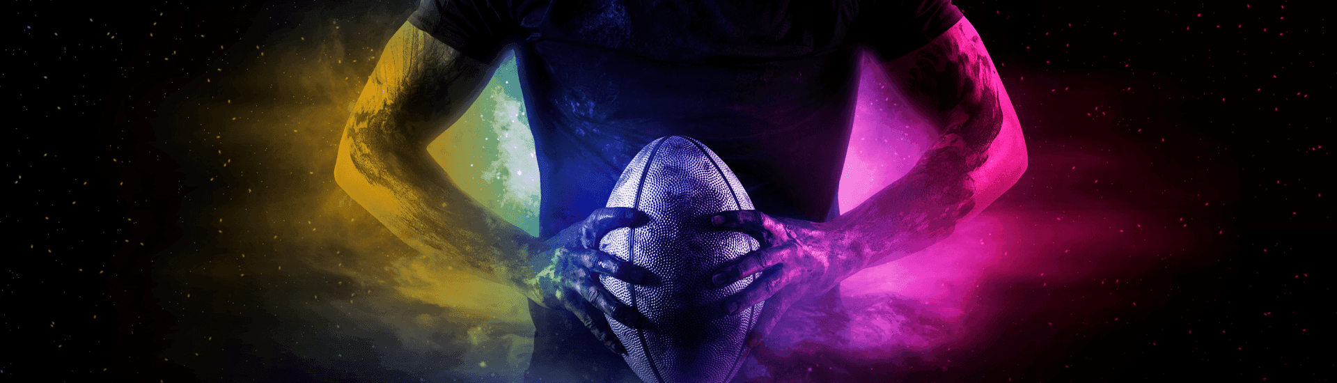 Person holding a rugby ball